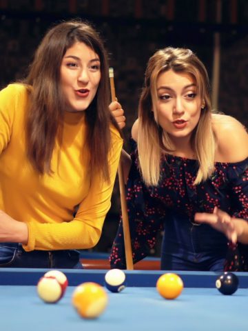 Picture of people playing pool