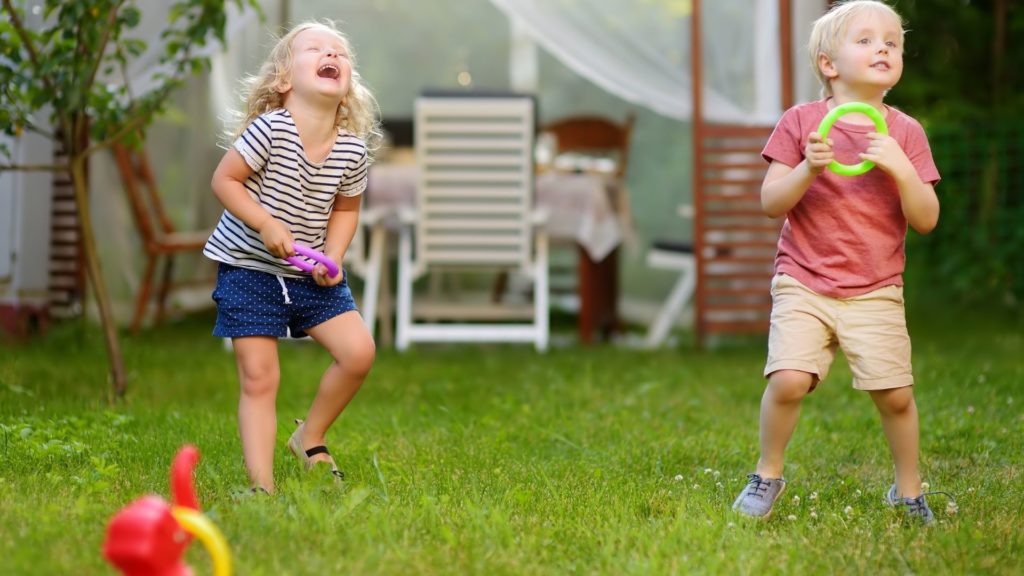 Picture of kids playing ring toss game