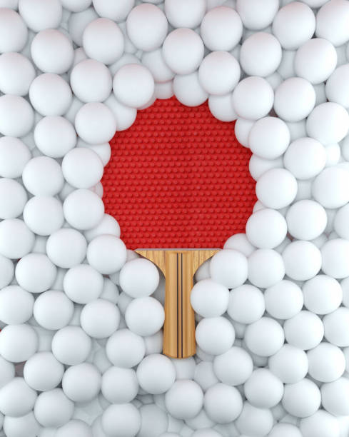 An ping pong racket isolated on many ping pong ball